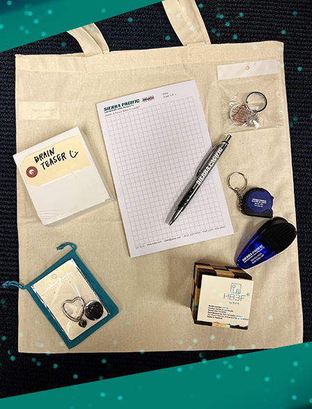 Scholarship swag: hat, notepads, brain teasers, tote bag